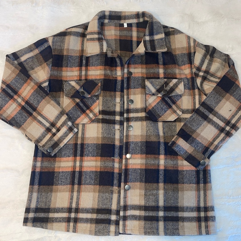 Button up flannel. Size large. Neutral with navy blue and peachy accent colors.